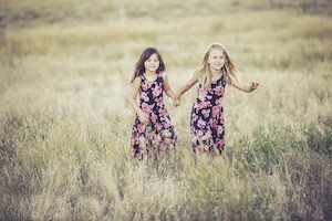 We all stand together - photo of two girls dressed the same