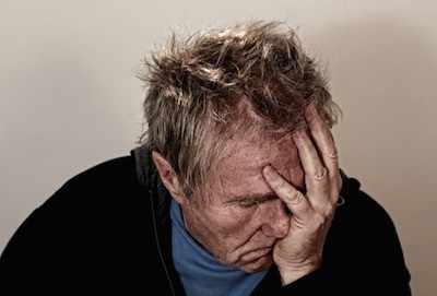 Fancy a smack in the teeth? - photo of despairing man